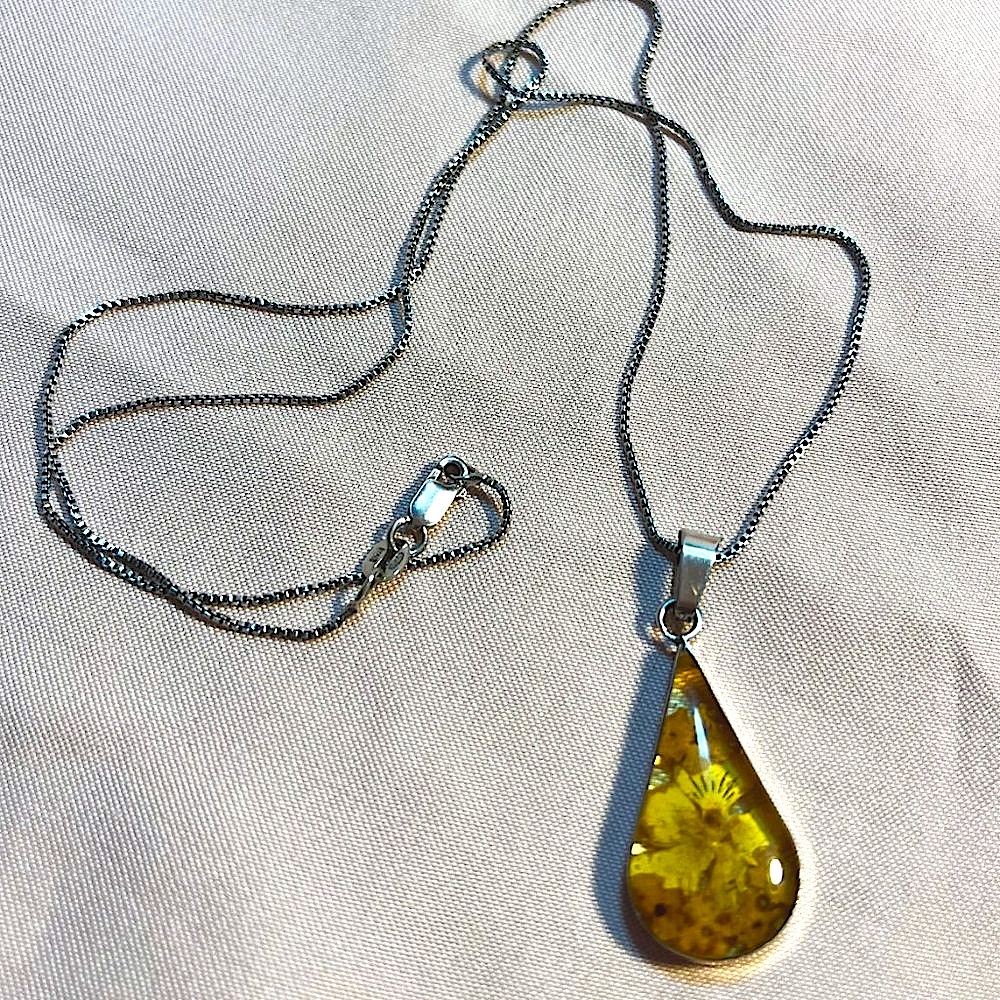 Silver Encased Flowers In Resin